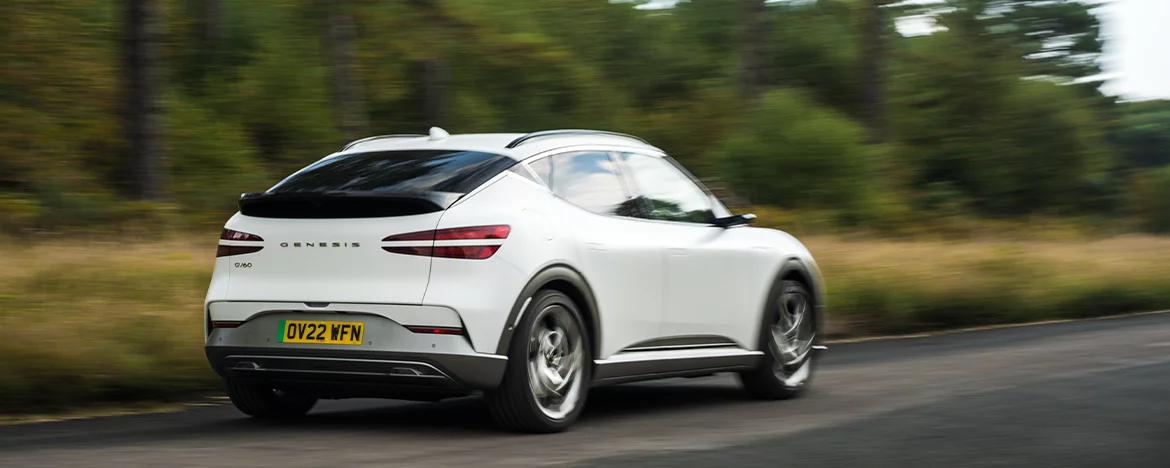 Genesis GV60 driving away