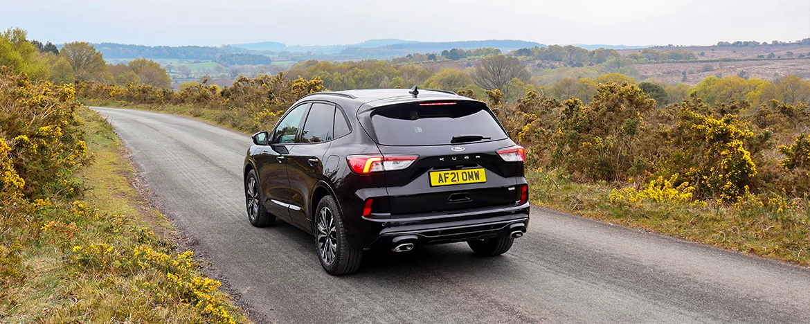 Ford Kuga rear view driving down the road