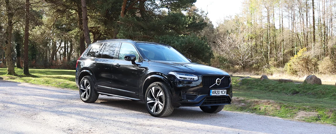 Volvo XC90 parked in countryside park