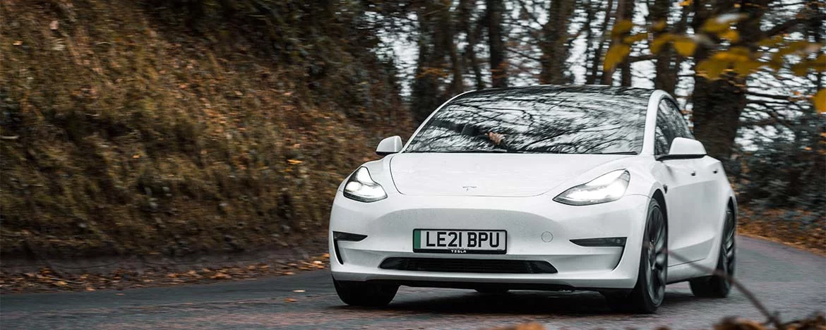 Tesla Model 3 driving