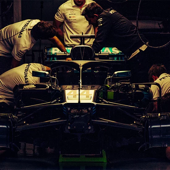 Mercedes-AMG engineers work on F1 car
