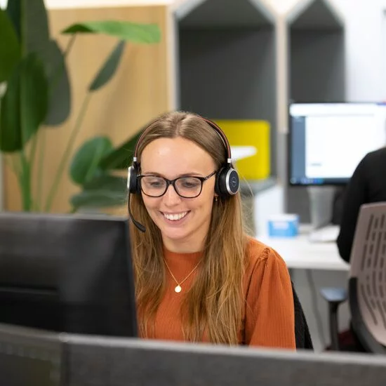 Carparison office and smiling phone agent