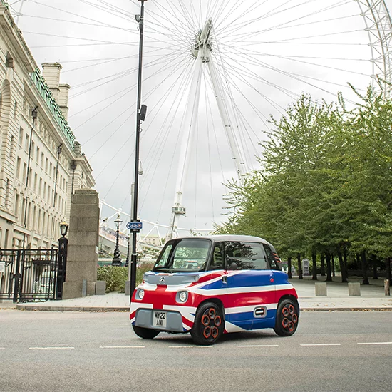Citroen Ami parked under London Eye