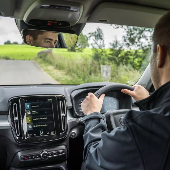 Man driving Volvo XC40
